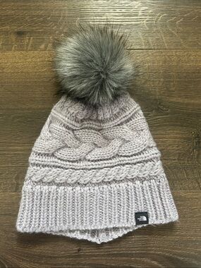 The North Face Women’s Purple/Gray Cable Knit Pom Beanie with Faux-Fur Pom